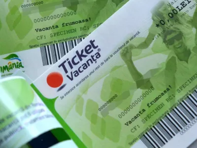 Angajații români care mai încasează vouchere de vacanță. Cui mai dă statul bani în plină tăiere de salarii și impunere de taxe