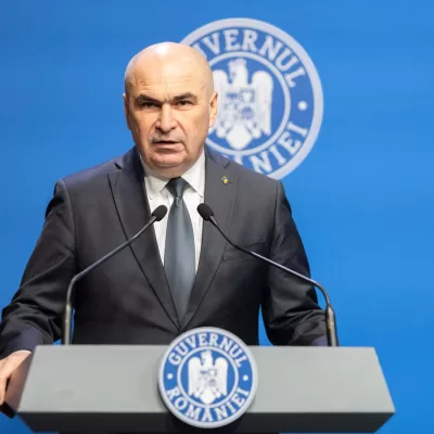 Bolojan taie salariile în 2026, reforma premierului nu iartă nimic. Sunt vizați angajații din administrația centrală